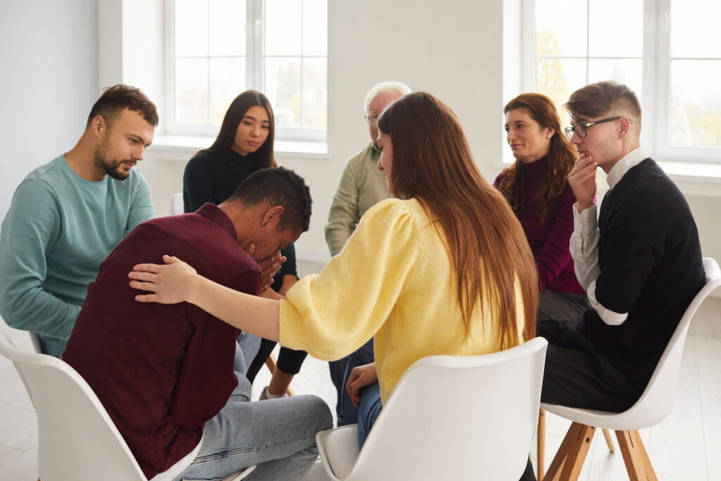 A patient at group therapy coping with his high-functioning anxiety