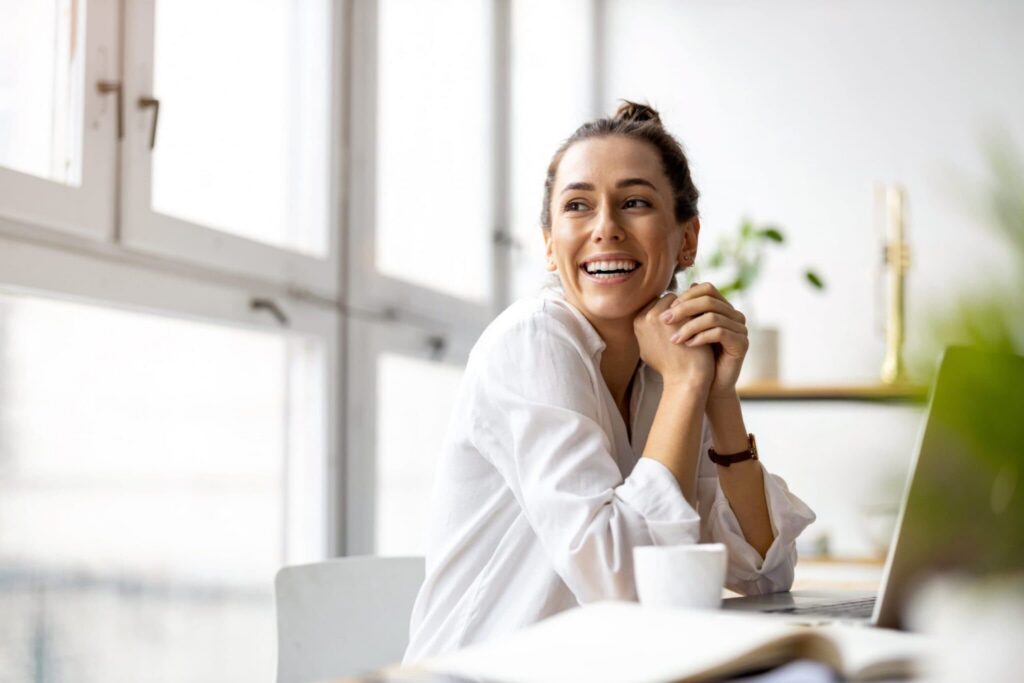 Woman smiling after receiving OCD treatment