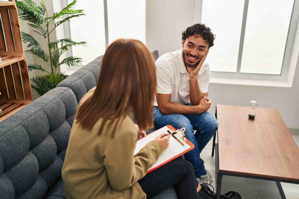 Therapist talking with patient during a mental health counseling session