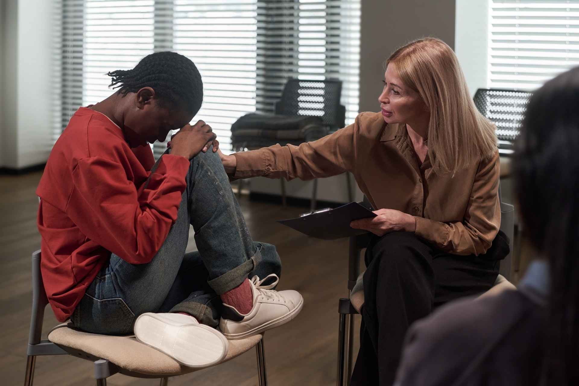 Person receiving support from a mental health professional.