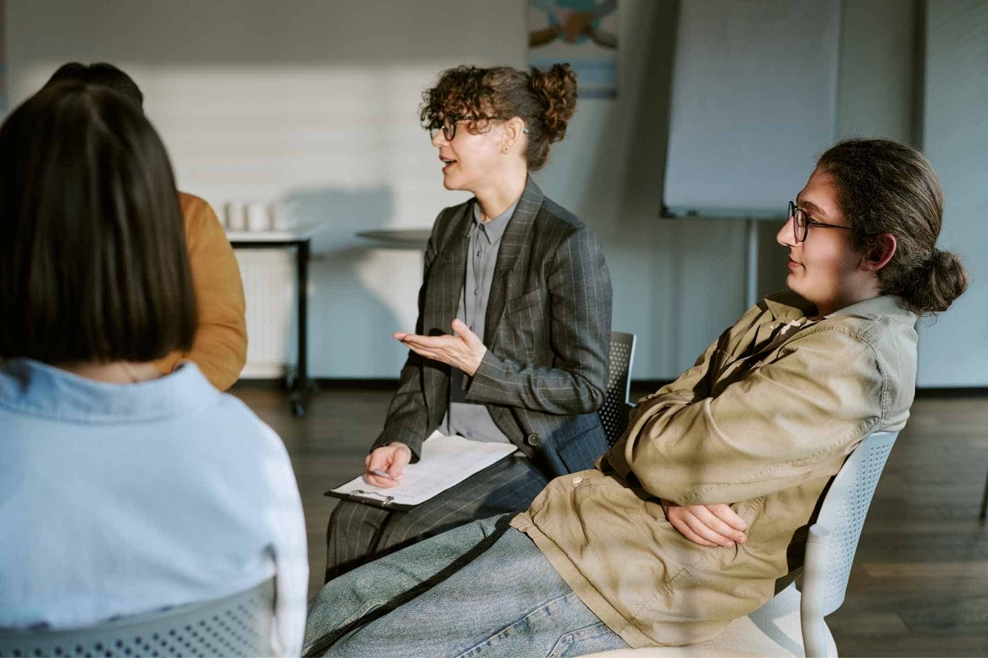 Person receiving emotional support during outpatient mental health treatment